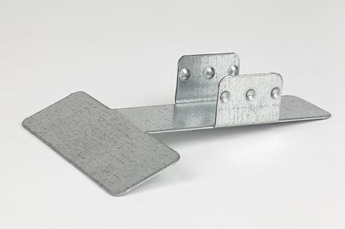 A metal bracket with a flat base and two perpendicular rectangular sections, each with multiple holes. The bracket appears to be made of galvanized steel and is likely used for structural support or connection in construction or mechanical applications.