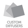 The image features three overlapping squares in varying shades of grey, representing custom diffusers. The text "CUSTOM DIFFUSERS" is written below the squares.