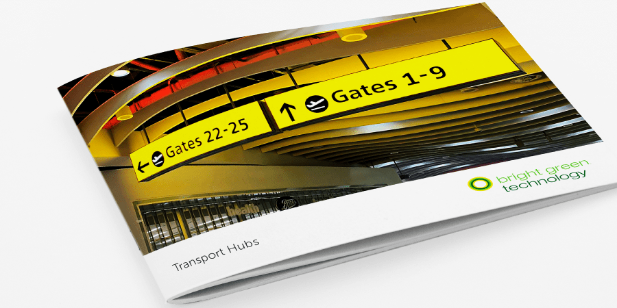 A brochure cover features a photo of an airport sign indicating directions to Gates 22-25 straight ahead and Gates 1-9 to the left. The bottom right corner has the logo and text for "bright green technology." The title "Transport Hubs" is written at the bottom.