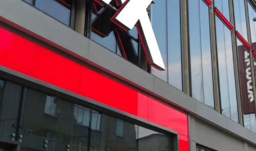 Illuminated glass facia for TK Maxx