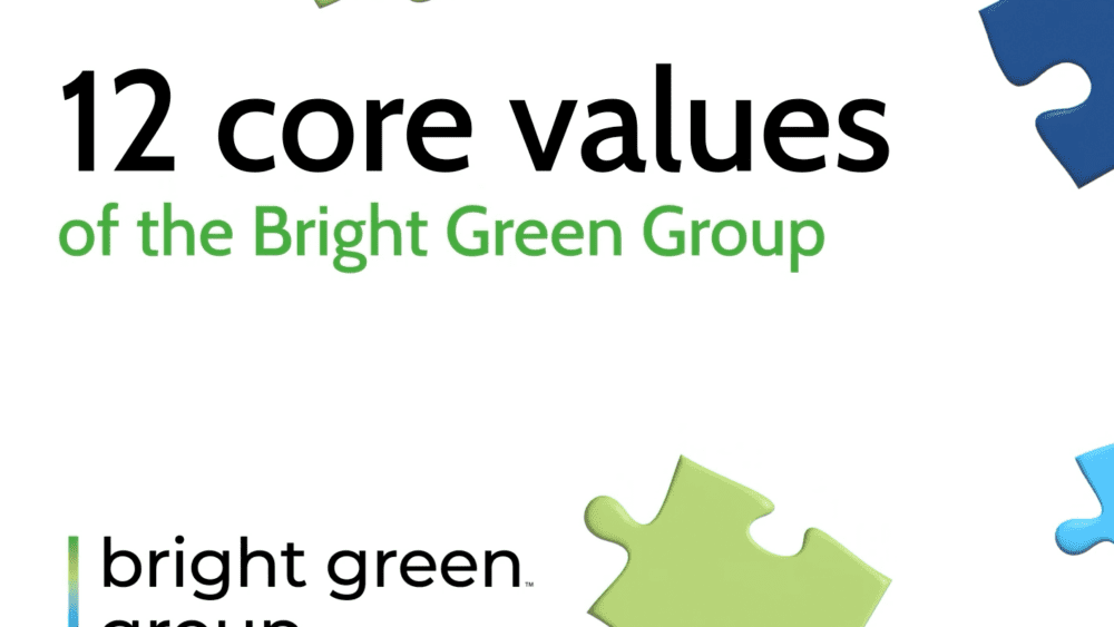 The image features the text "Bright Green Group 12 Core Values" at the center. Below, the Bright Green Group logo is displayed, consisting of the words "bright green group" next to a green and blue vertical line design. Colorful puzzle pieces are arranged around the edges.