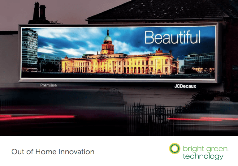 A brightly LED-lit billboard at night displays a picturesque image of an ornate building with the word "Beautiful" in bold white letters. Blurred red and white lights from passing vehicles add to the scene. Bottom text reads "Out of Home Innovation" with a logo and "bright green technology".