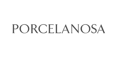 White background with the word "PORCELANOSA" in gray, capitalized, and centered, elegantly highlighted against backlit surfaces.