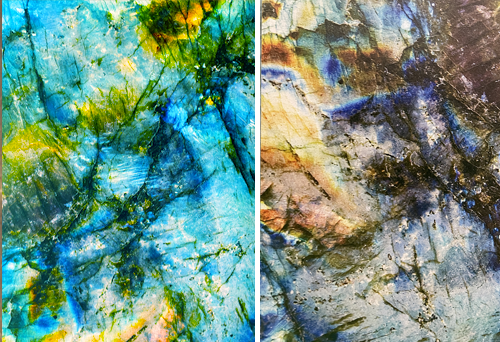 Abstract close-up of a polished, multicolored labradorite stone on a backlit surface. The image reveals iridescent patterns with shades of blue, green, gold, and hints of dark veining, highlighting the stone's natural play of color and texture.